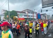Meriah! Ribuan Warga Ambon Padati Color Fun Walk 2026 Pakai Jersey Piala Dunia